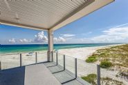 Modern coastal piling home in Navarre by Acorn Fine Homes - Thumb Pic 31