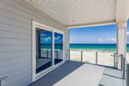 Modern coastal piling home in Navarre by Acorn Fine Homes - Thumb Pic 32