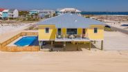 Gomel beach rental piling home on Navarre Beach by Acorn Fine Homes