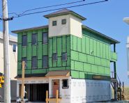 Davis modern coastal piling home on Navarre Beach by Acorn Fine Homes - Thumb Pic 10