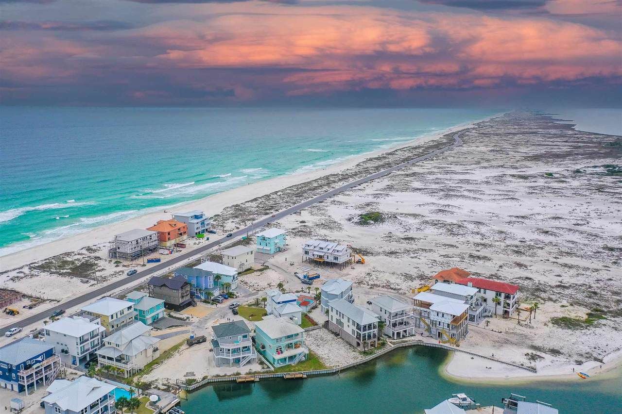 Slone modern coastal piling home on Navarre Beach by Acorn Fine Homes