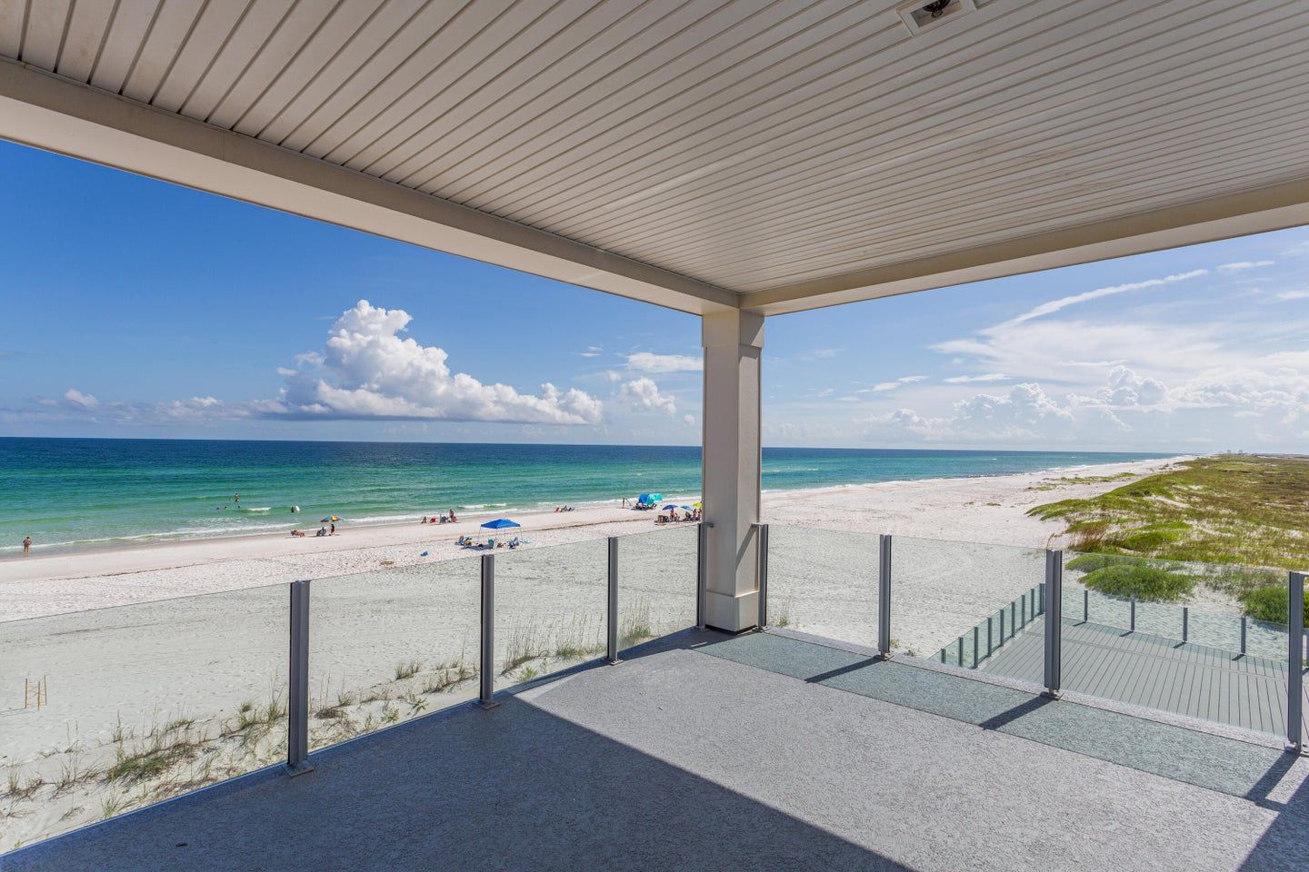 Modern coastal piling home in Navarre by Acorn Fine Homes