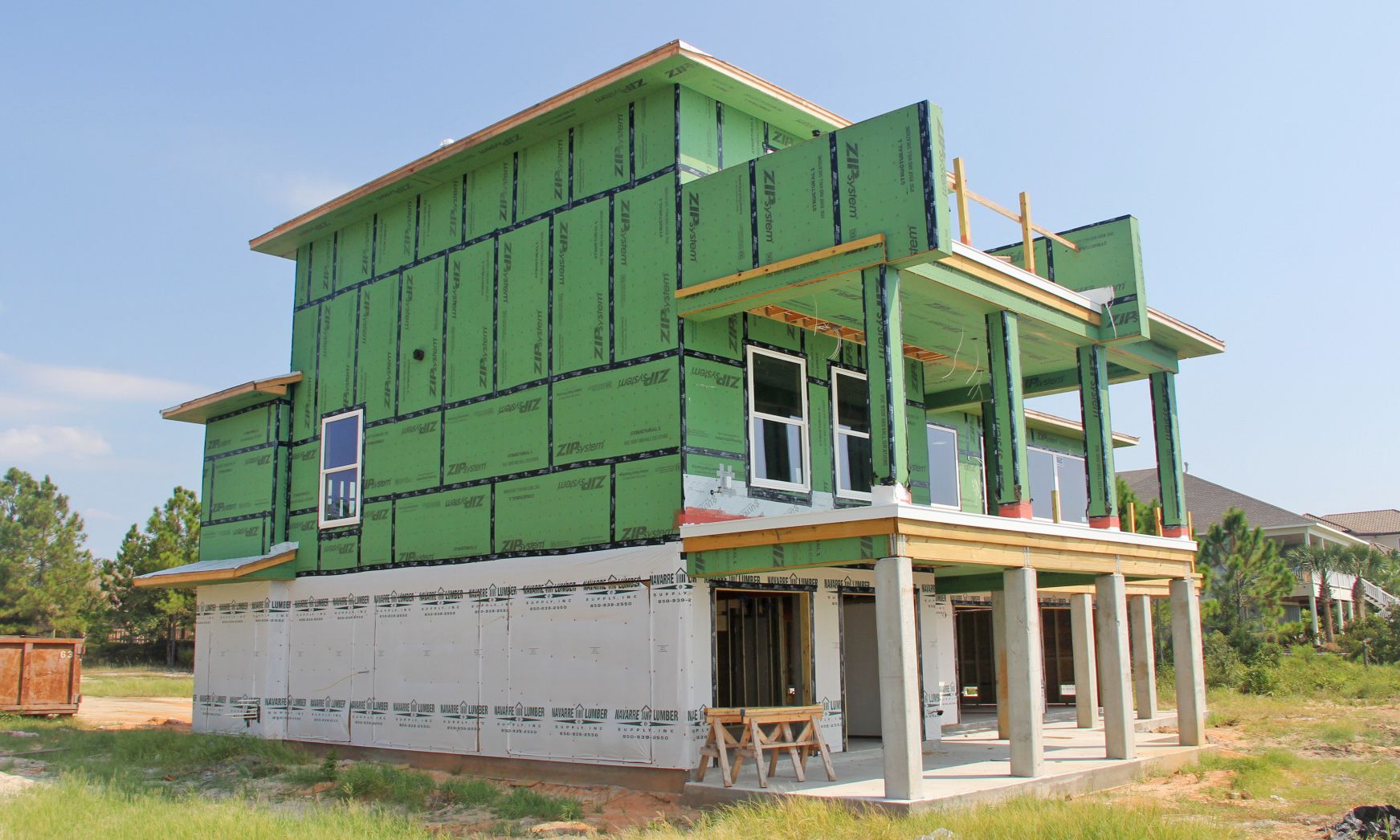 Modern piling home in Navarre by Acorn Fine Homes