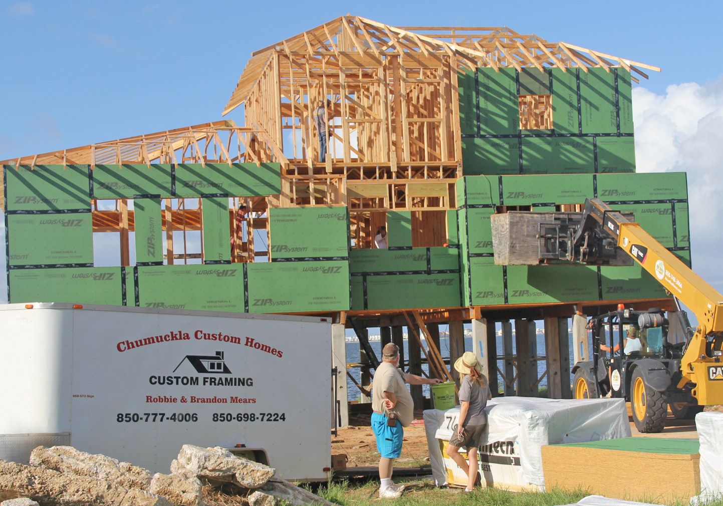 Modern piling home in Navarre by Acorn Fine Homes