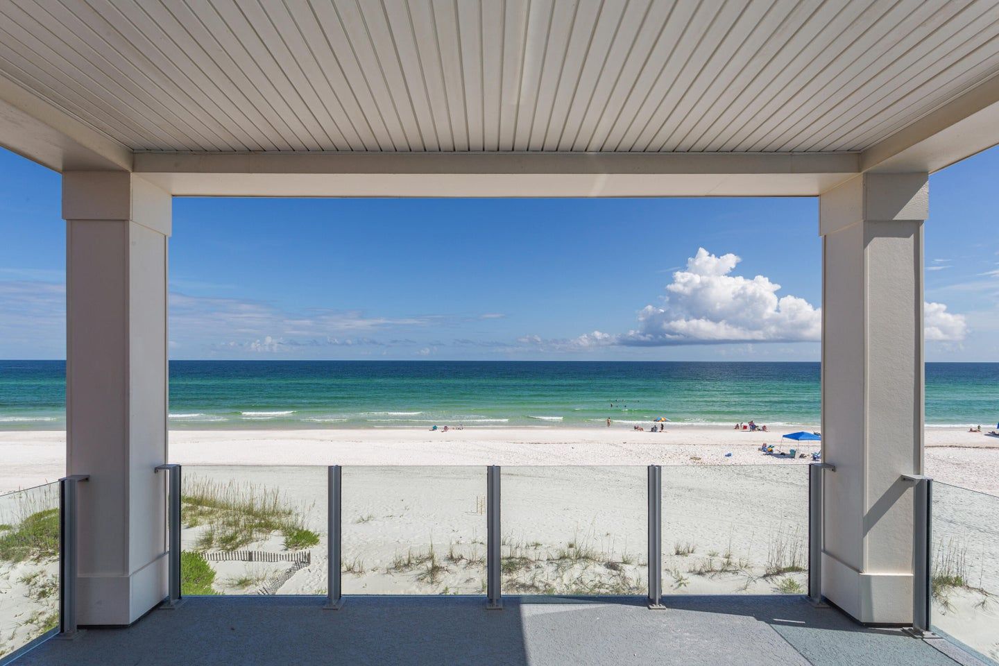 Modern coastal piling home in Navarre by Acorn Fine Homes