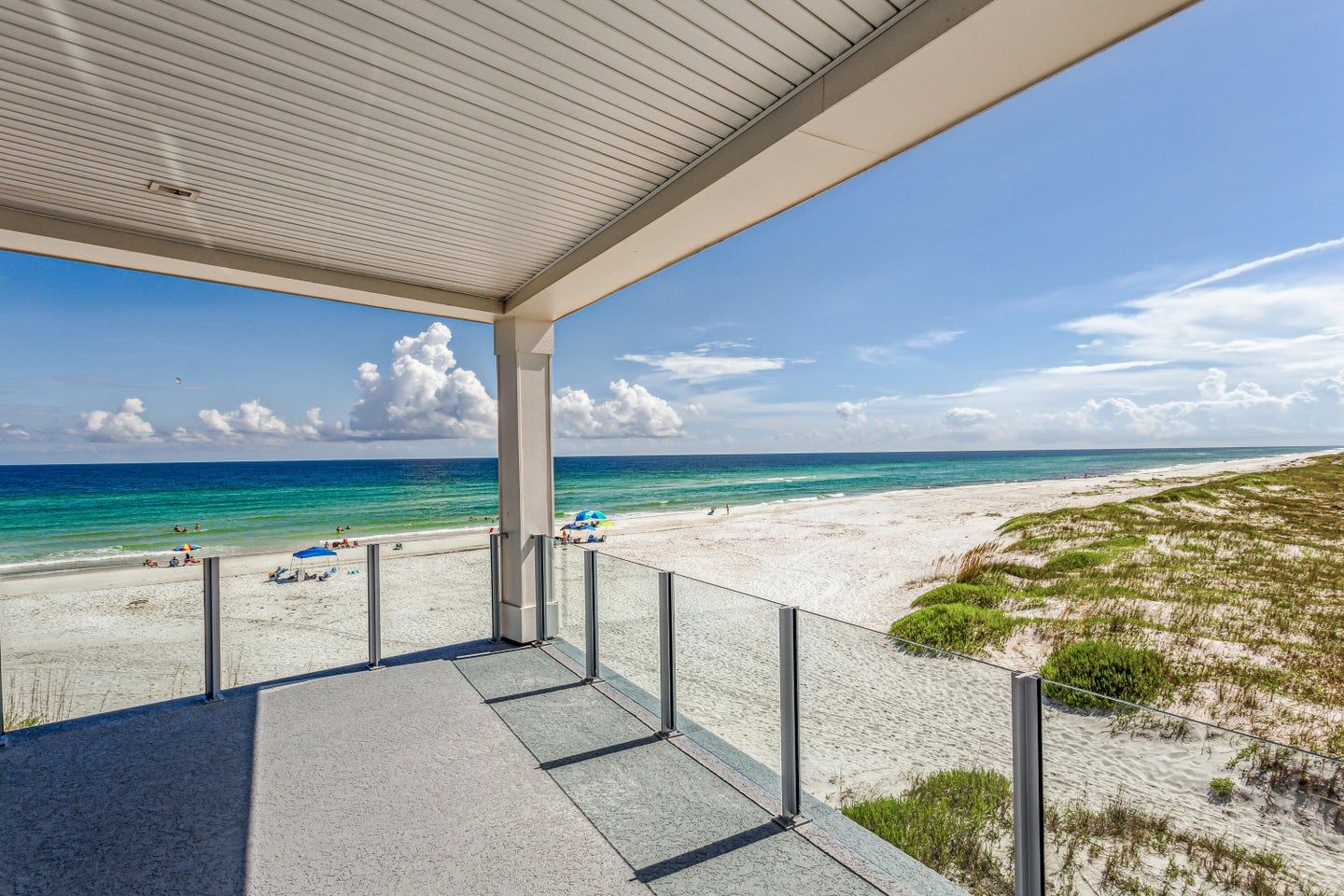 Modern coastal piling home in Navarre by Acorn Fine Homes