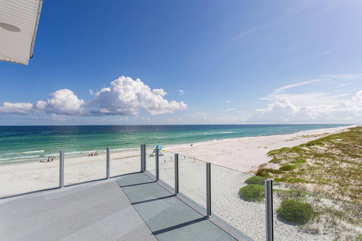 Modern coastal piling home in Navarre by Acorn Fine Homes