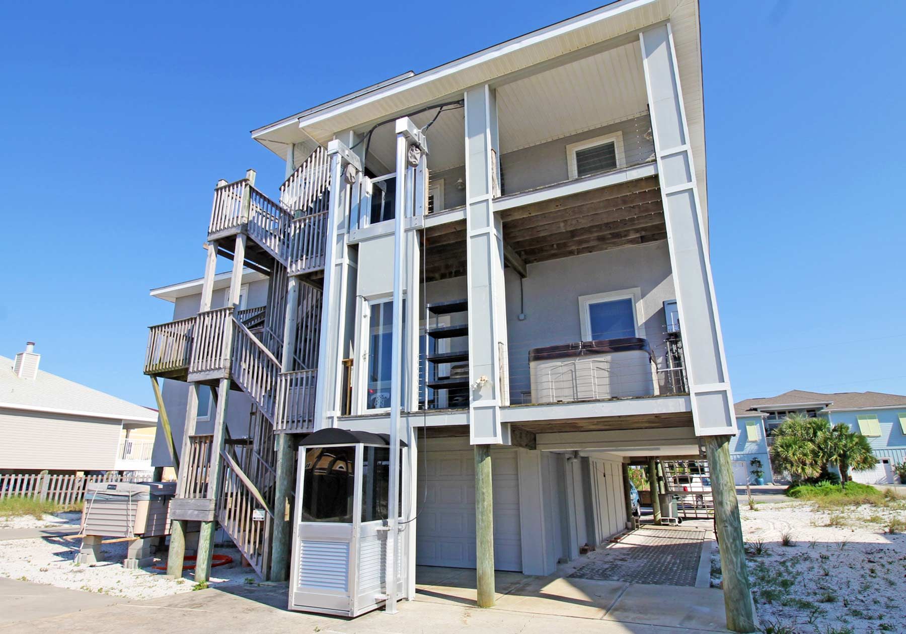 Exterior elevator by Acorn Fine Homes