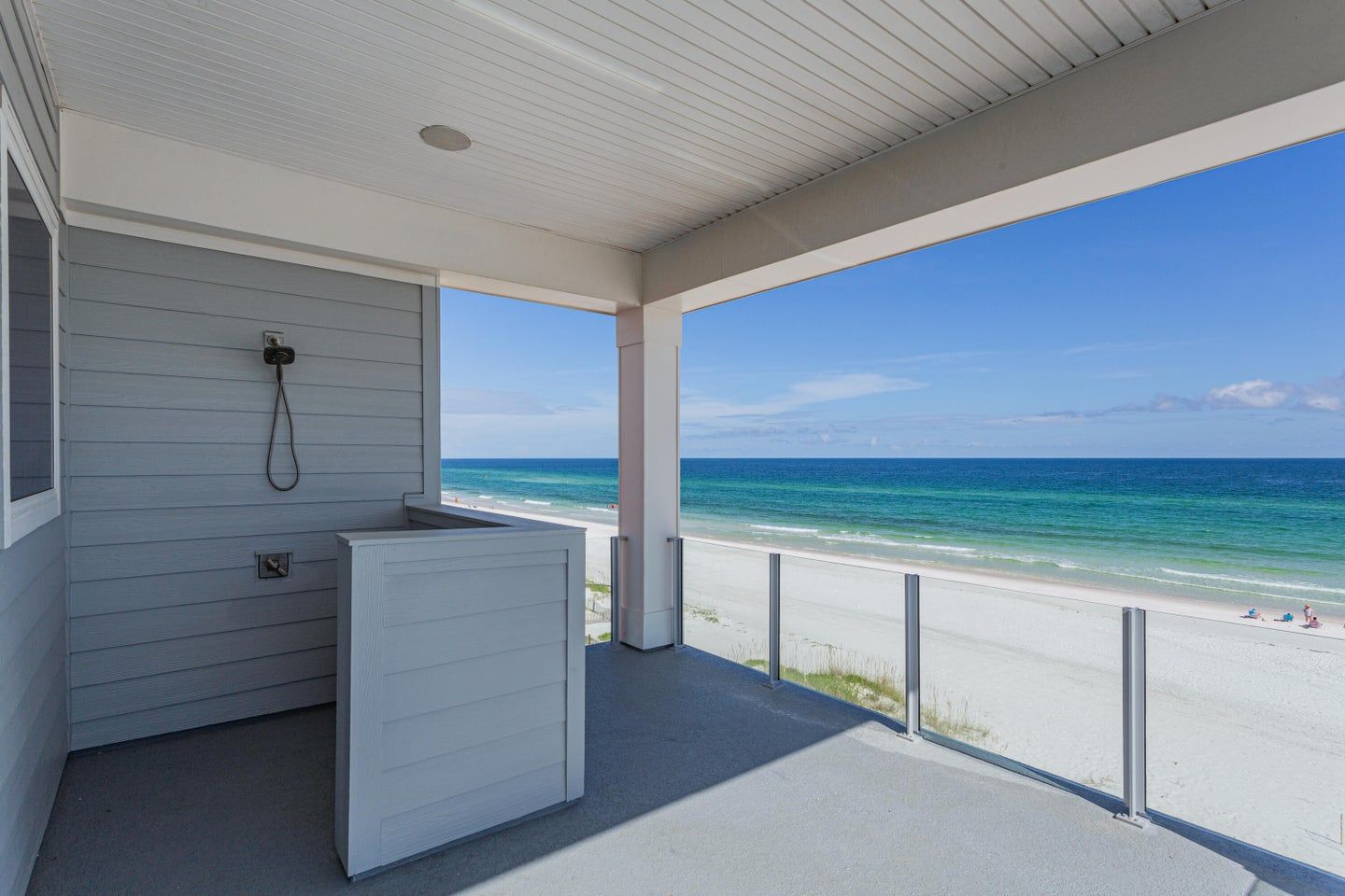 Modern coastal piling home in Navarre by Acorn Fine Homes