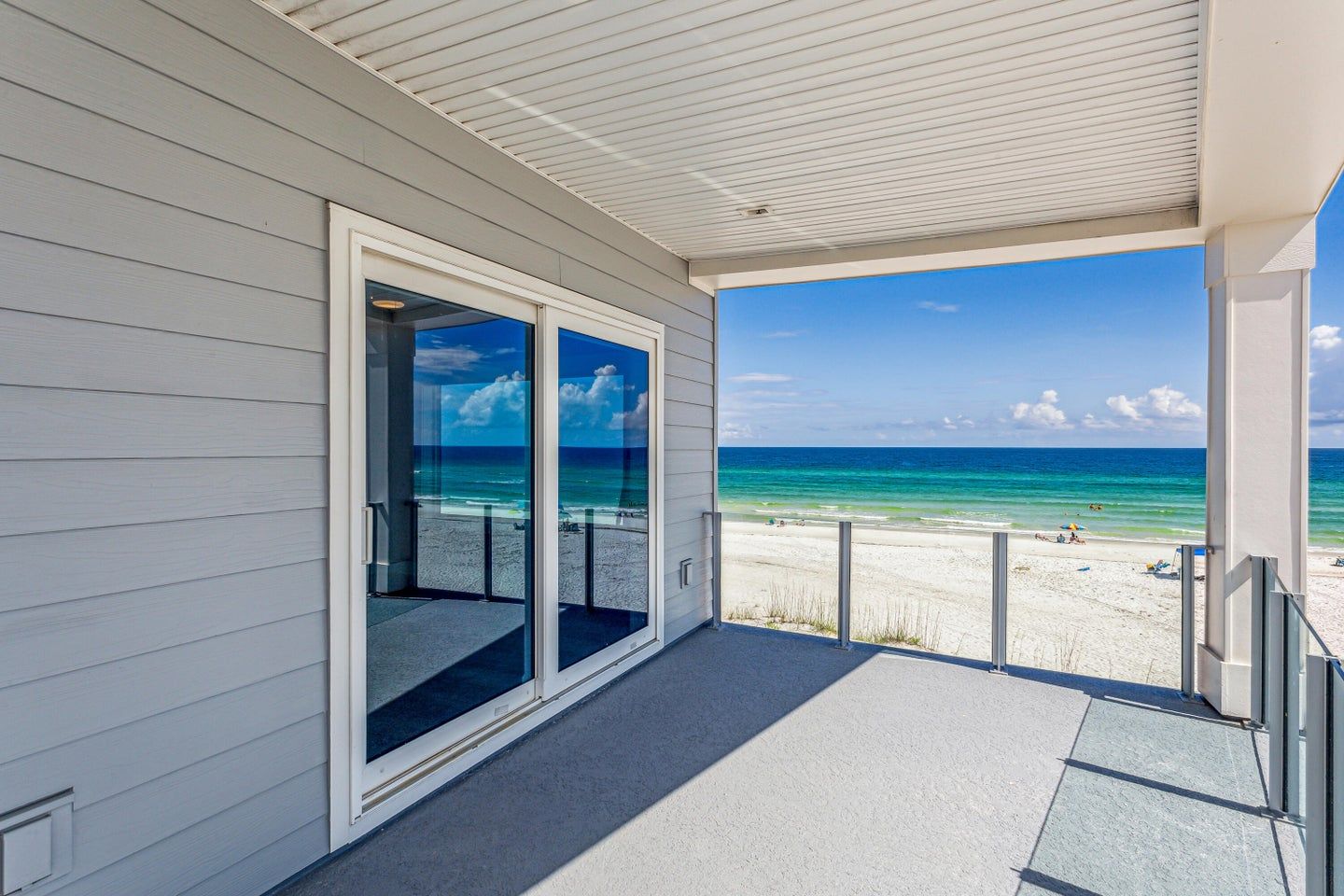 Modern coastal piling home in Navarre by Acorn Fine Homes